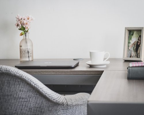 Person relaxing in an armchair at home after work